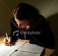 Stock-photo-119271-young-woman-doing-her-homework.jpg